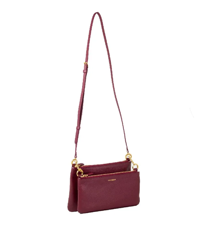 Coccinelle Pochette pelle Yvonne Bordeaux