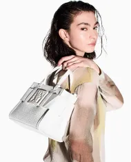 Armani Exchange Borsa a mano piccola traforata Bianco